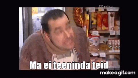 a man is standing in front of a shelf in a store with the words `` ma ei teeninda teid '' written on it .