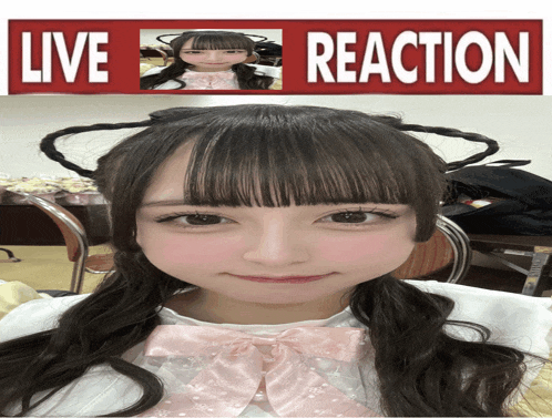 a picture of a girl with a pink bow and a sign that says live reaction