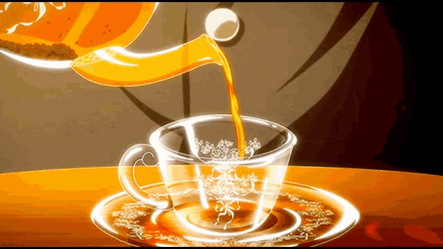 a cup of tea is being poured into a saucer on a table