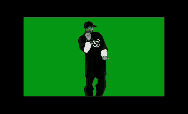 snoop dogg is dancing on a green screen while holding a pink object .