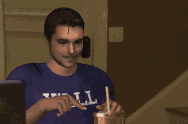 a man wearing a t-shirt that says y'all on it