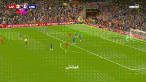 a soccer game is being played in a stadium and the score is liv 2-1 che