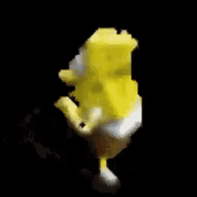 a blurry picture of a spongebob squarepants character standing on a black background .