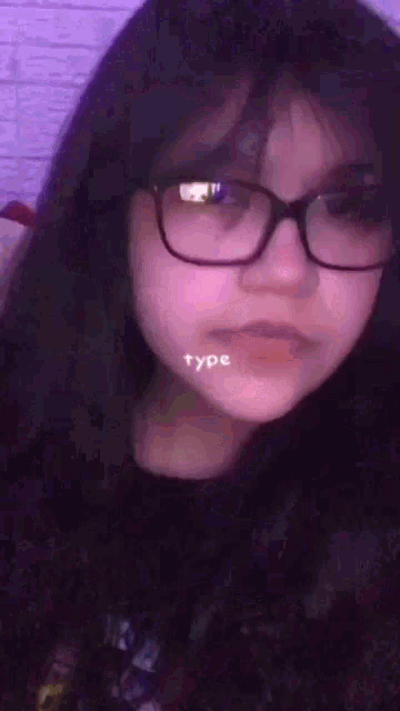 a girl with glasses and horns on her head says bitch