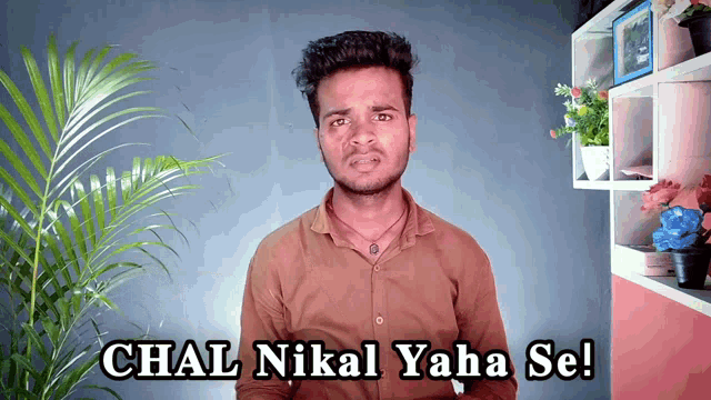a man in a brown shirt with the words chal nikal yaha se written below him