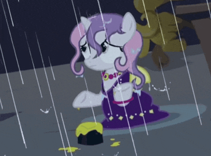 a pony in a purple dress is standing in the rain next to a cake