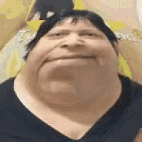a close up of a person 's face with a very big neck .