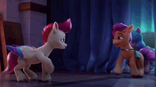 a couple of ponies standing next to each other in a dark room