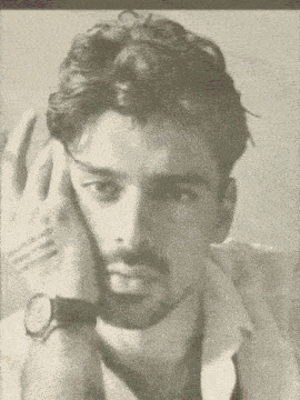 a black and white photo of a man with a red dot on his forehead and samuray on the bottom