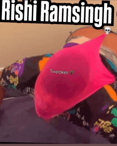 a person laying on a bed with a pink tweaker on their butt