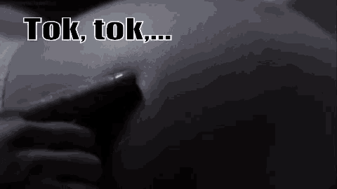 a close up of a person 's torso with the words tok tok written on it