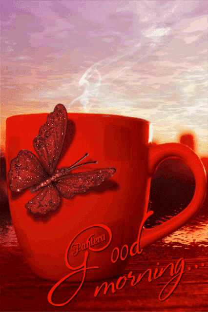 a red cup with a butterfly on it and the words " good morning " on the bottom