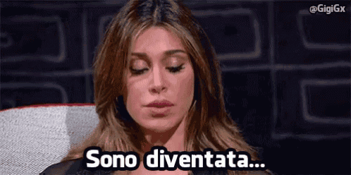 a woman with her eyes closed and the words sono diventata