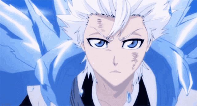 a white haired anime character with blue eyes