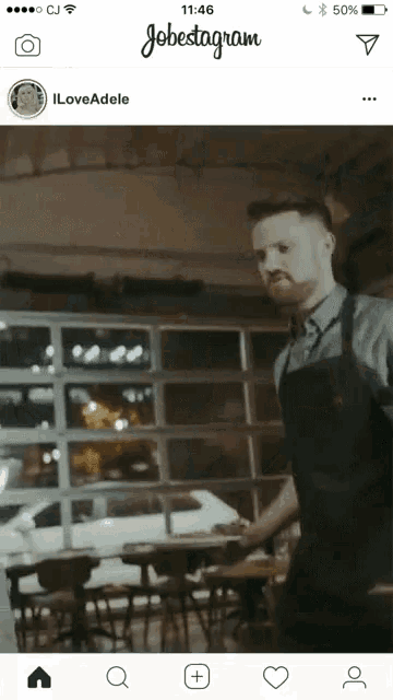 a man in an apron is standing in front of a table in a restaurant on a jobstagram post