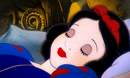 a cartoon of snow white sleeping in a bed with her eyes closed