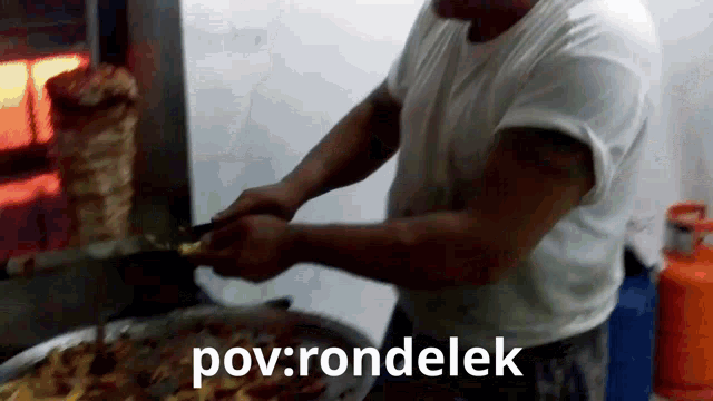 a man in a white shirt is cooking food and the words pov : rondelek are visible
