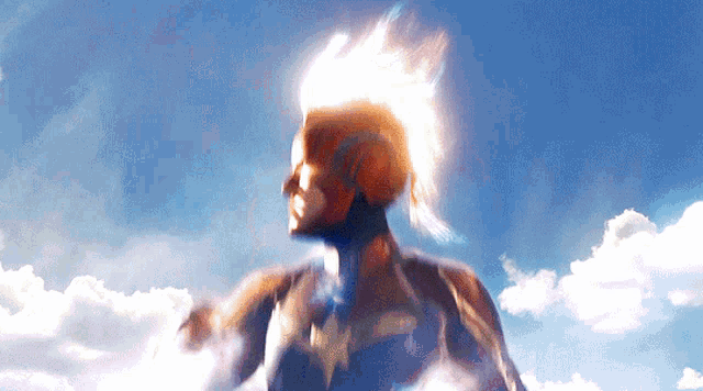 a woman in a superhero costume is flying through a cloudy blue sky