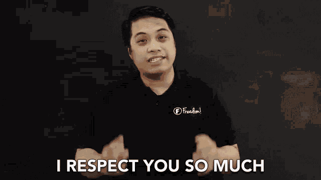 a man is standing in front of a blackboard and says `` i respect you so much '' .