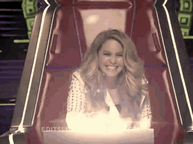 a woman is sitting in a chair with the word edits written on the bottom