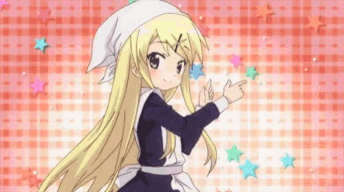 a girl with blonde hair and a bandana on her head pointing at something