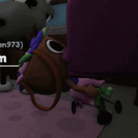 a screenshot of a video game shows a purple chair and a stuffed animal