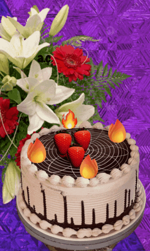 a cake with strawberries and candles on it