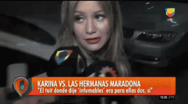 a woman talking into a microphone with the words karina vs. las hermanas maradona at the bottom