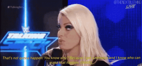 a woman is talking into a microphone on a talking smack live show .