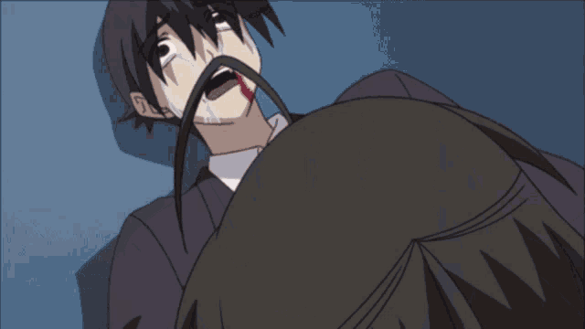 a person with blood coming out of their nose and mouth