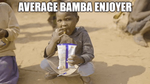 a child is eating a bag of chips and the caption average bamba enjoyer