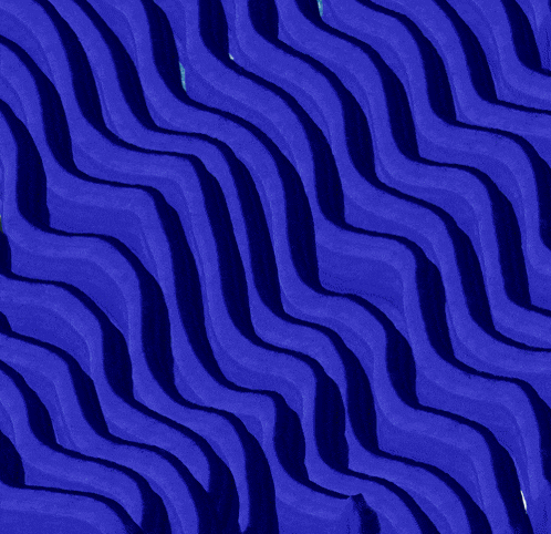 a blue striped background with a white flower in the foreground