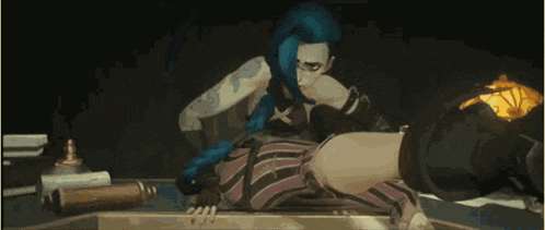 a cartoon character with blue hair is sitting on a table with a lamp .