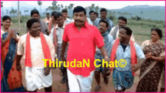 a man in a red shirt is standing in a crowd of people with the words thiruda n chat written on the bottom