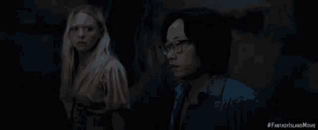 a man and a woman standing next to each other with the words fantasy fucking island written below them