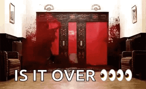 a bloody elevator with the words is it over written on it