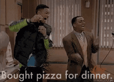 two men are dancing in a kitchen with the words bought pizza for dinner on the bottom