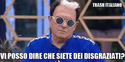 a man wearing sunglasses and a blue shirt says trash italiano .