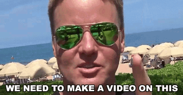 a man wearing sunglasses with the words we need to make a video on this below him