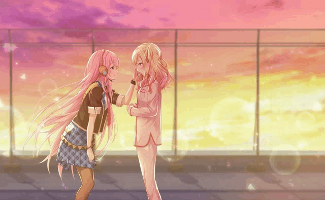 two anime girls are standing next to each other