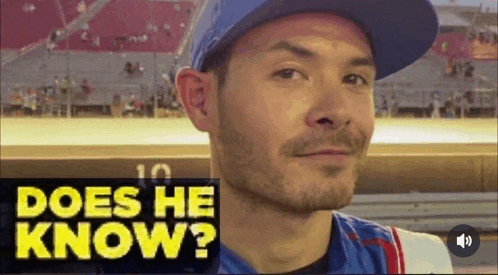 a man wearing a blue hat is being asked does he know ?