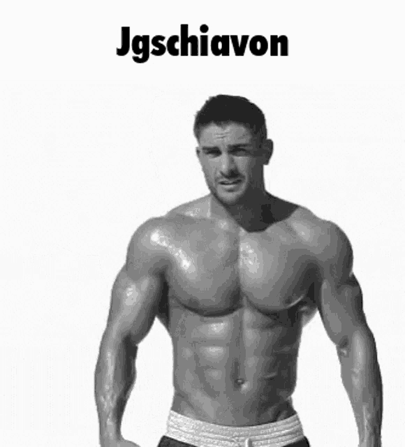 a shirtless man flexes his muscles in a black and white photo under the name jgschiavon