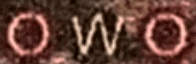 a blurred image of a person 's face with the letters o and w visible