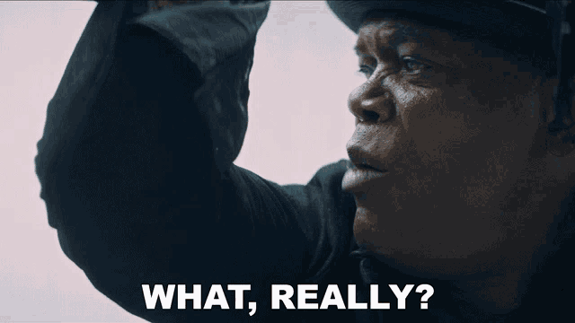 a man wearing a hat says " what really "