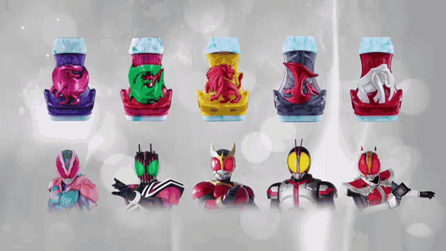 a group of action figures are lined up on a white surface