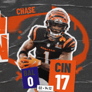 a bengals football player named chase is holding a ball