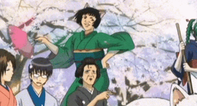 a group of anime characters are standing next to each other in front of cherry blossom trees .