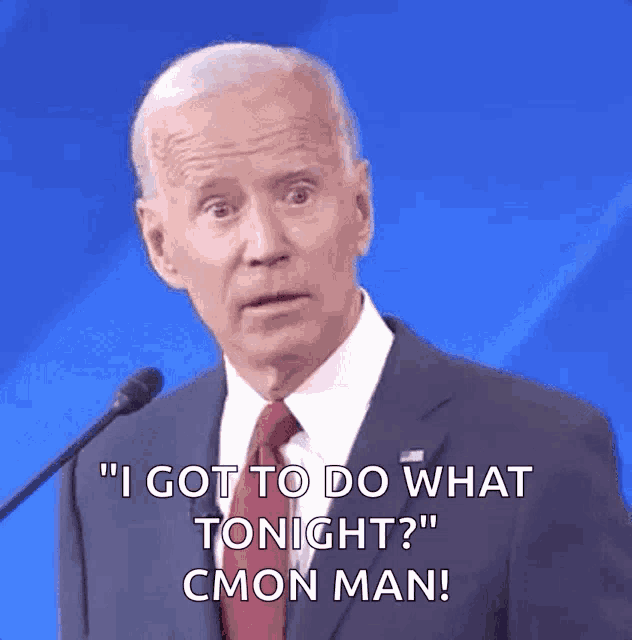 a man in a suit and tie is talking into a microphone and says " i got to do what tonight "