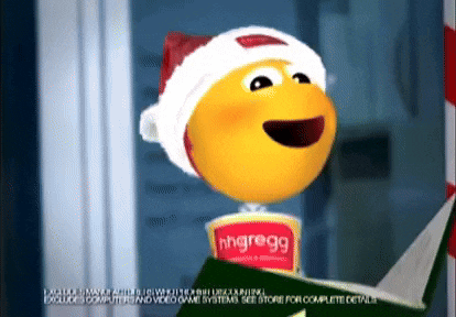 a smiley face is wearing a santa hat and holding a cup of nhgregg