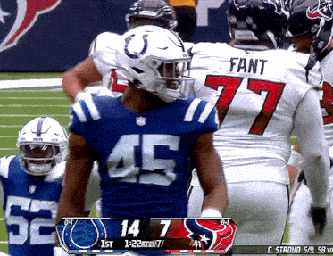 a football player in a blue uniform with the number 45 on it